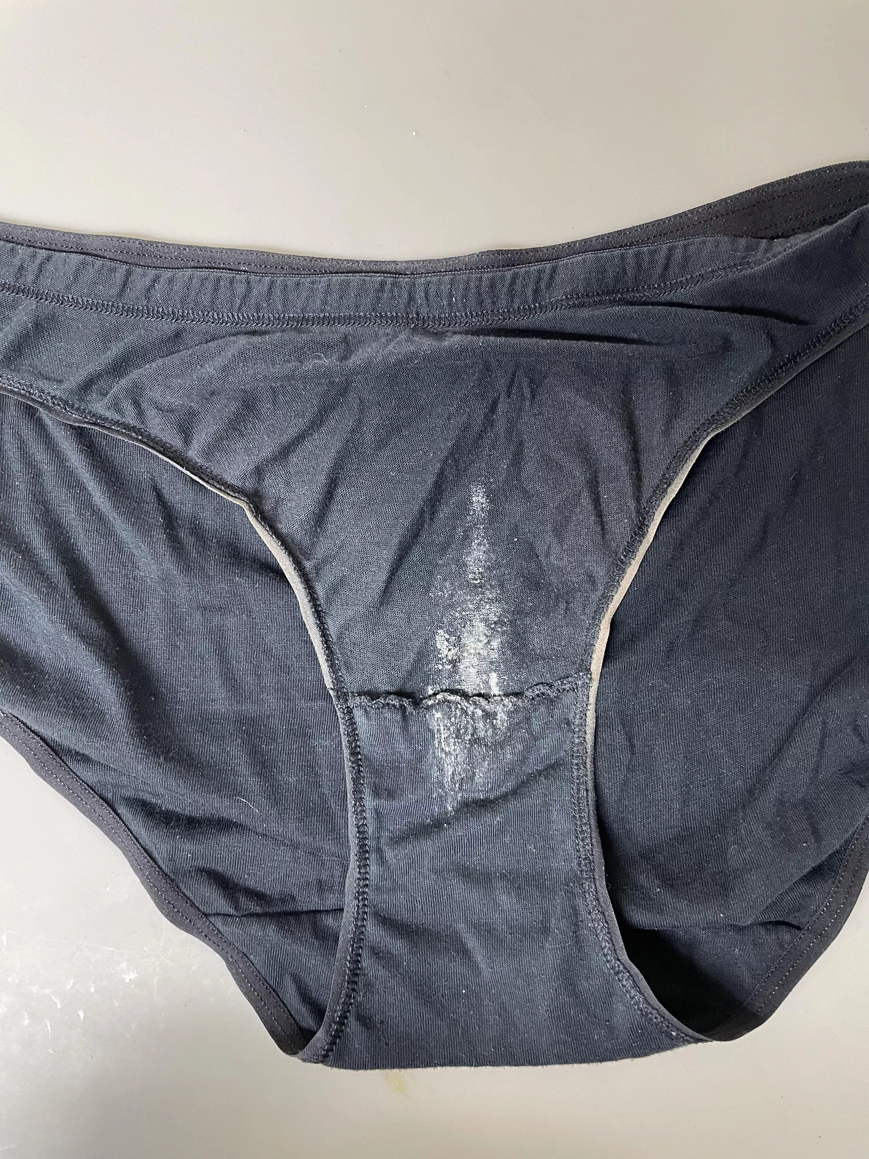 I love how stains look on black cotton panties