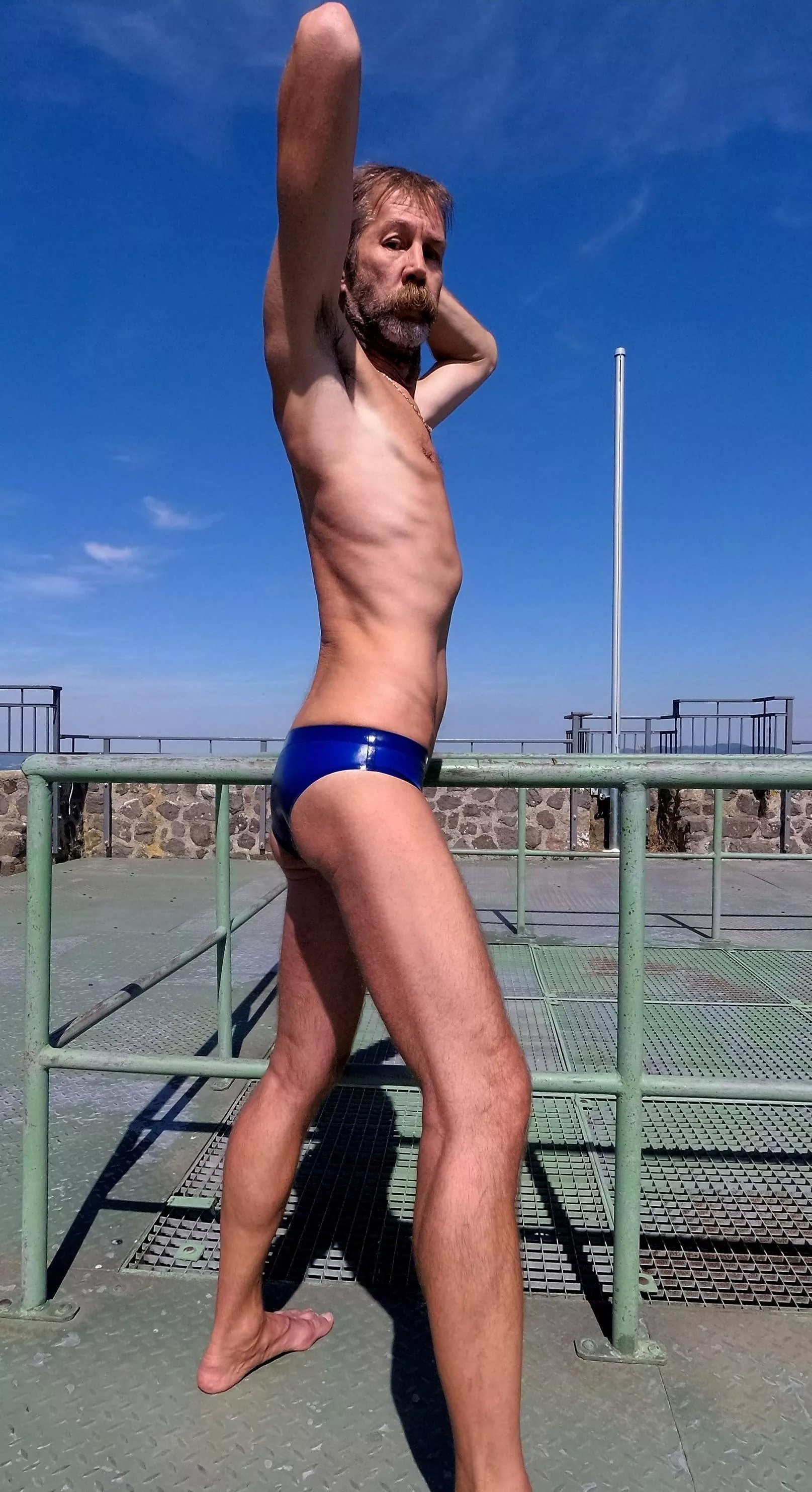 Enjoy my slim body in latex speedos