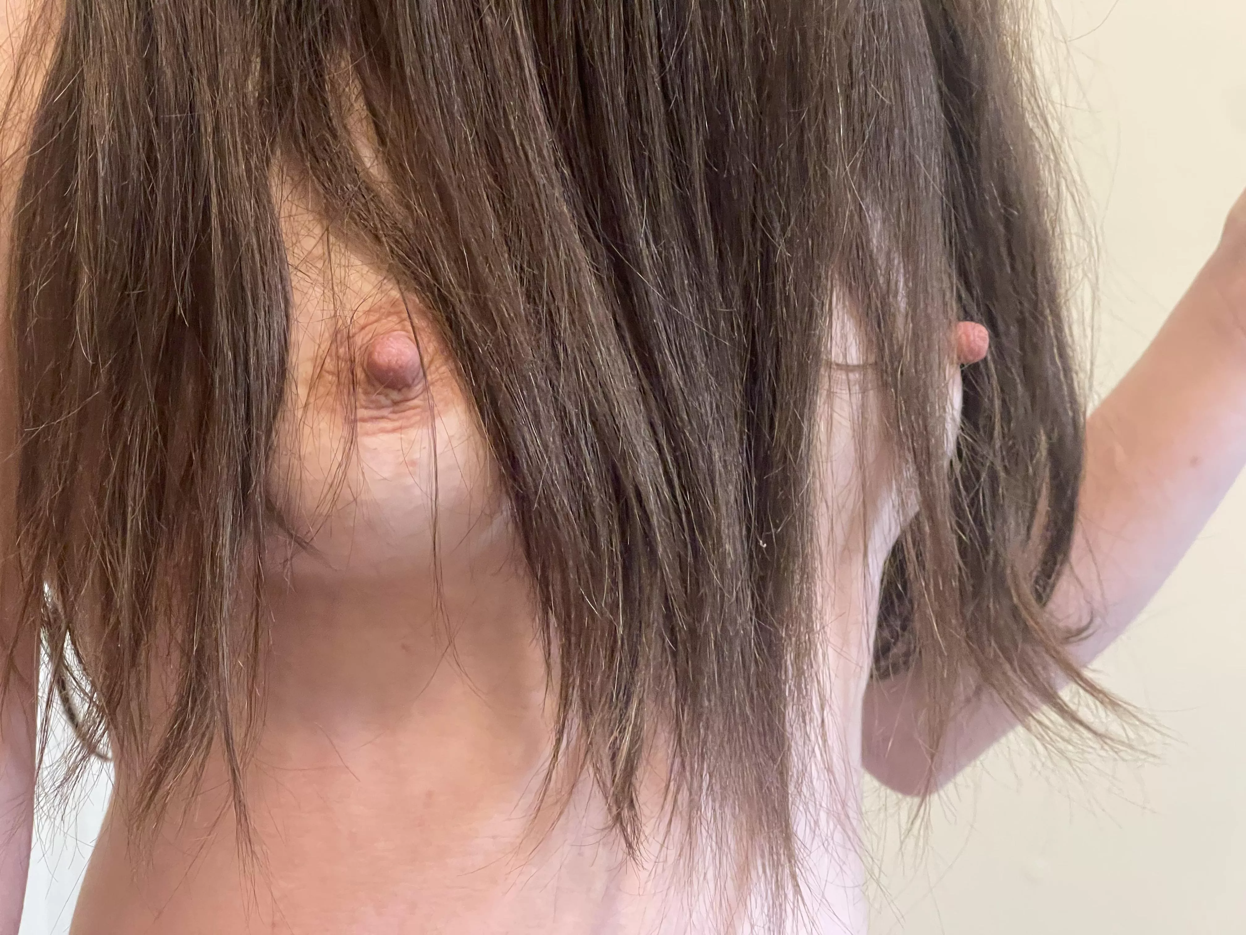 Nipples poking through my hair lol