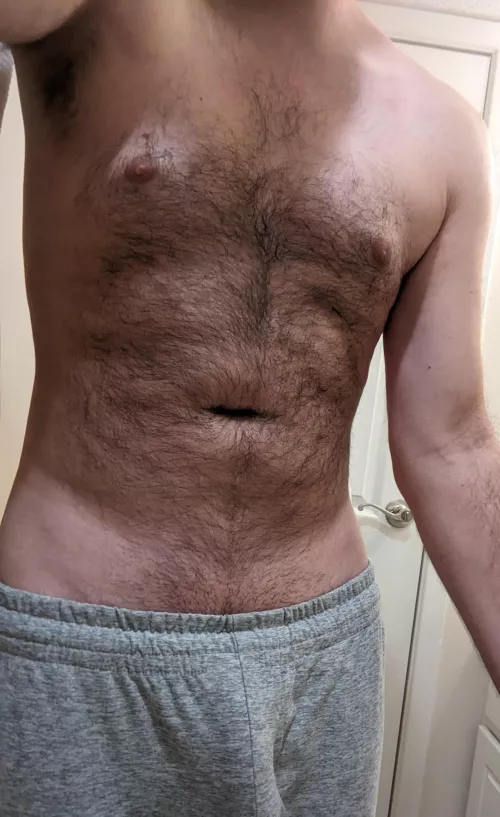 6'5 with the grey sweatpants 