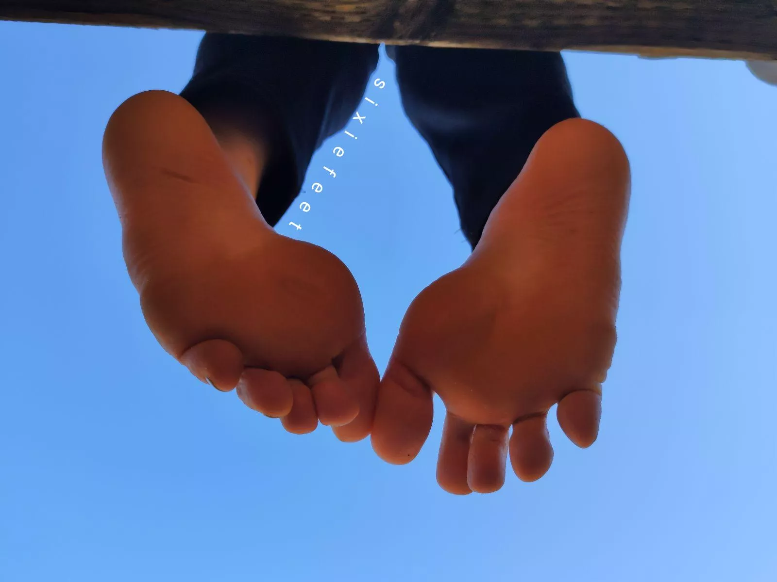 Feet in your face.
