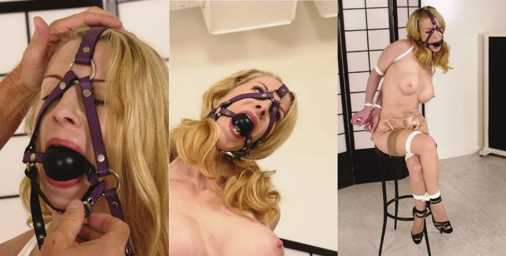 Eden is rocking this harness ballgag quite well...