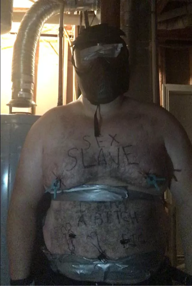 Tape bondage in the basement.