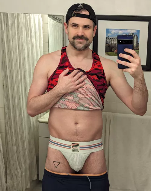 Does anyone else wear a jockstrap under their workout clothes to show off while in the locker room?