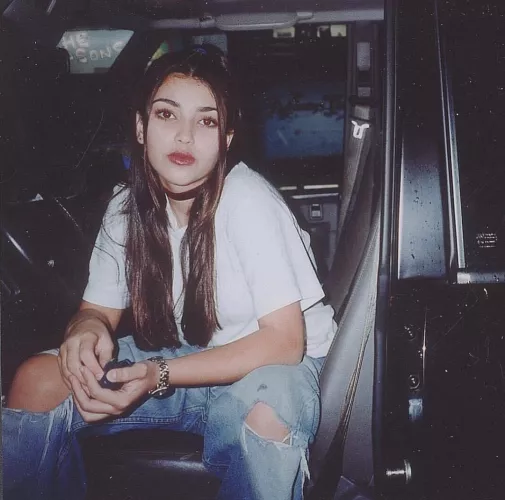Teenage Kim Kardashian in the 90s