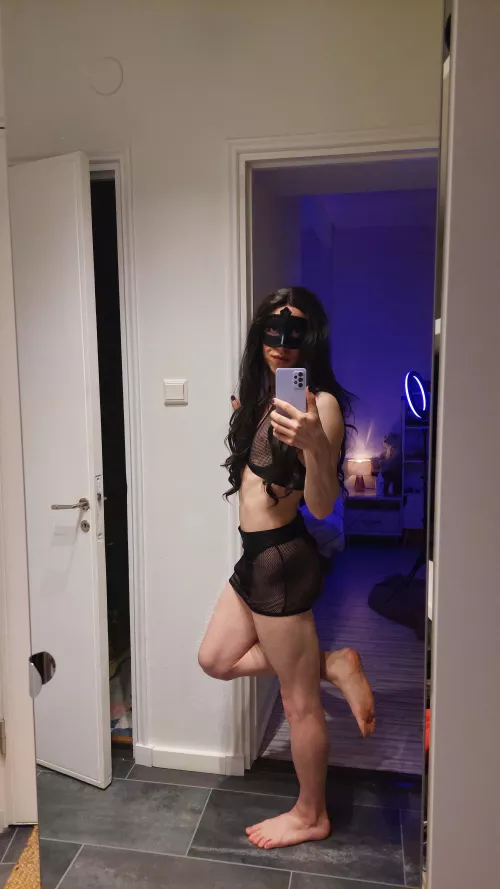 There's something under this fishnet skirt