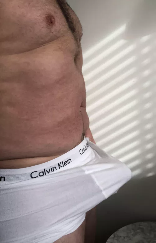 (52) year old man in underwear