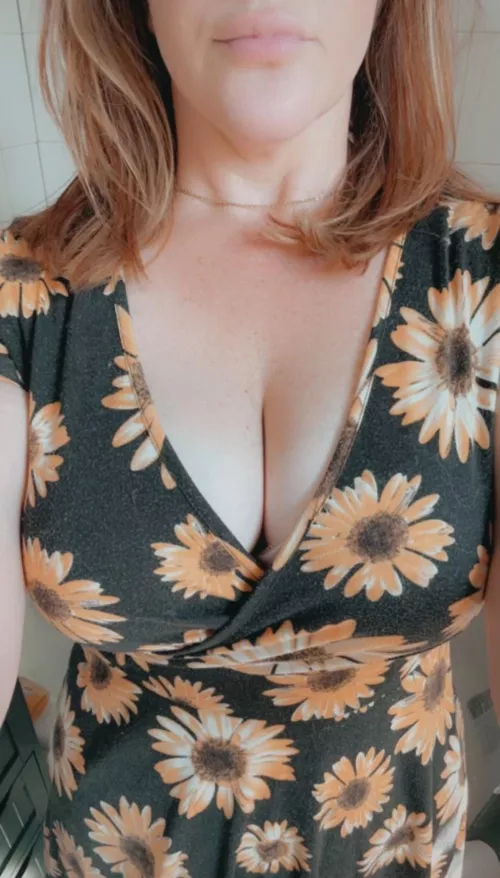 Redhair and sunflowers 