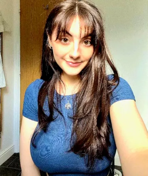 Anybody knows who she is