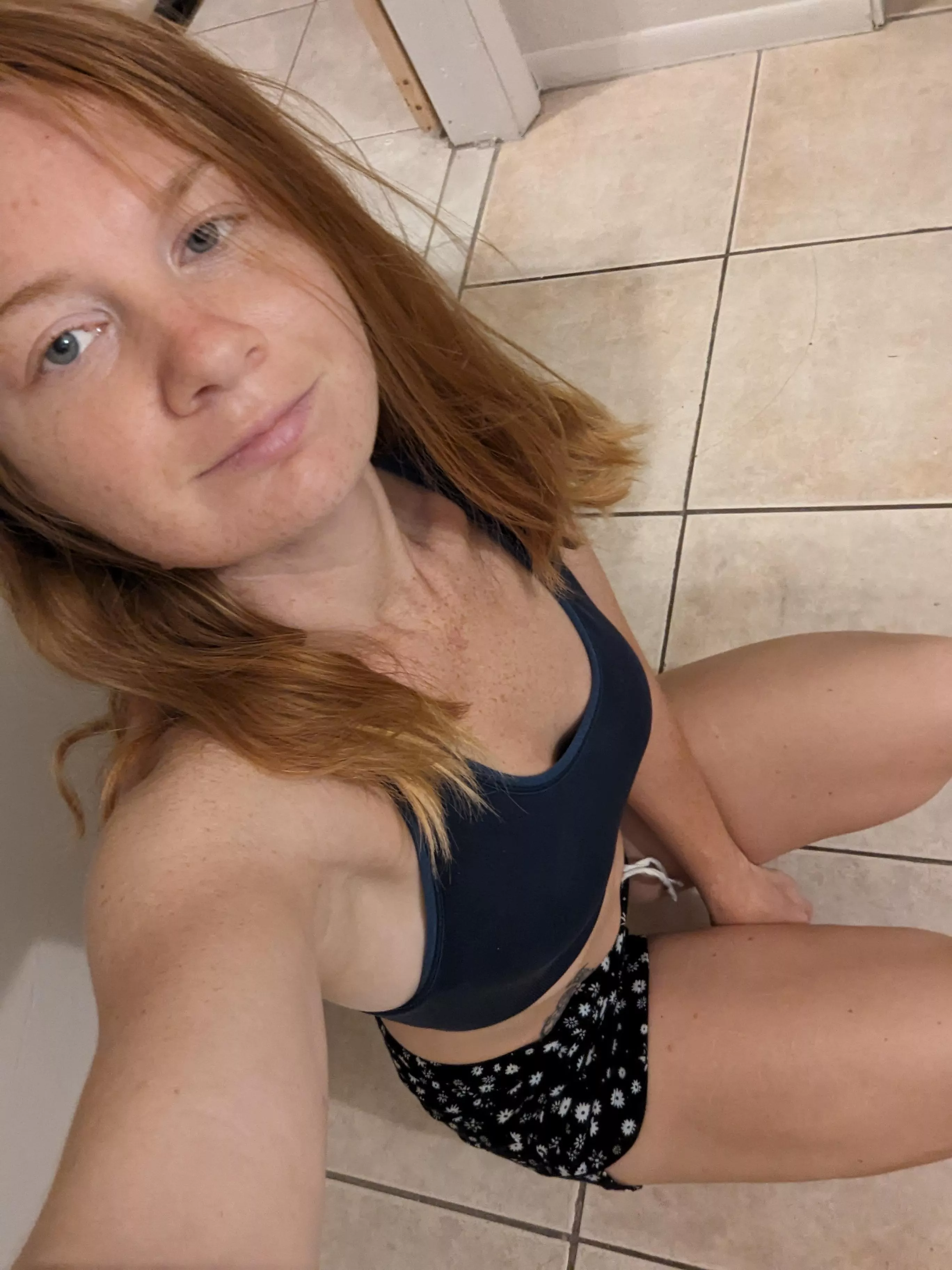 Unpretentious redhaired beauty