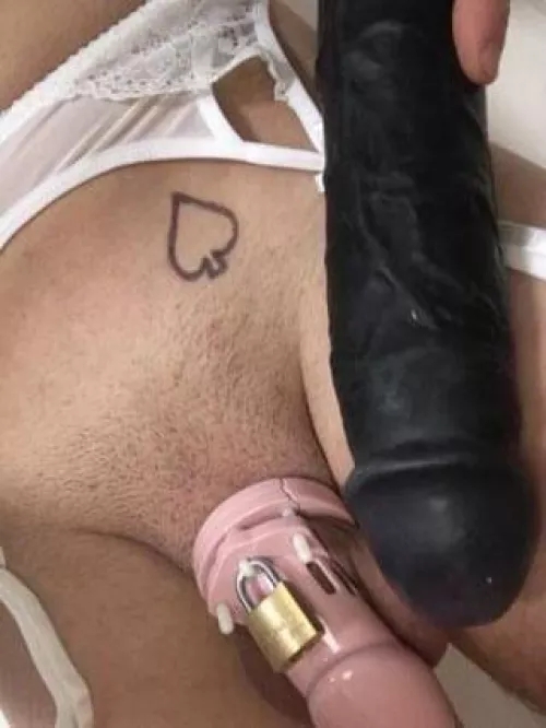 Caged clitty n Big black dildo