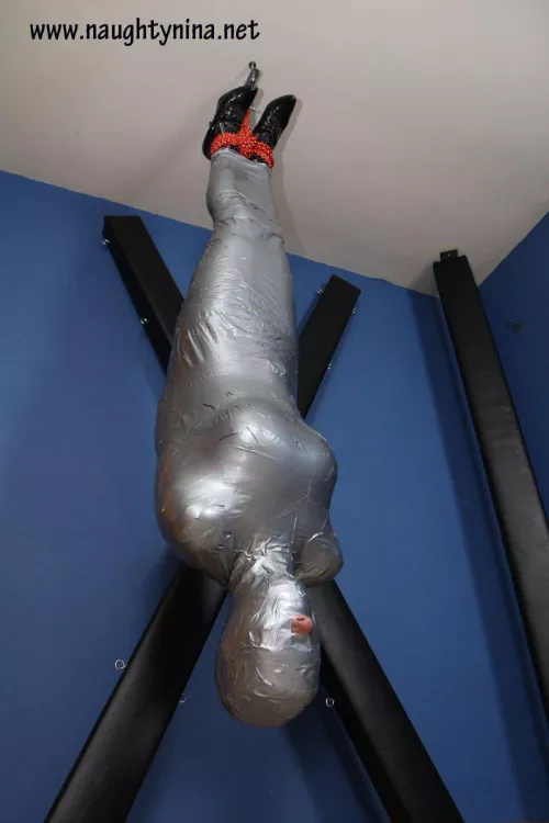 Fantasy #861 utter helplessness. I know being upside for extended periods of time can be very dangerous but man I would love to be upside down and wrapped, losing all sense of spatial feeling, bonus for ear plugs so I can't hear anything.