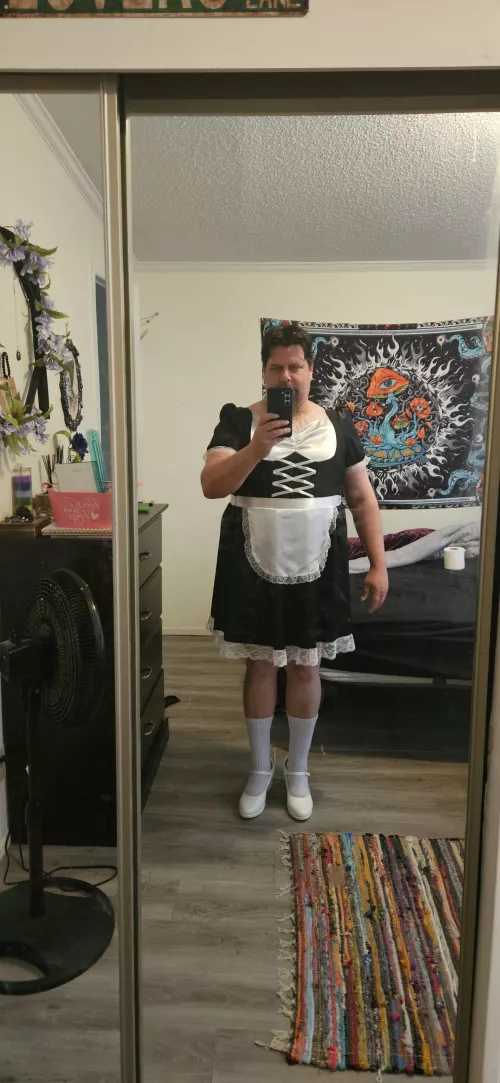 I very much enjoy cleaning while wearing a maids outfit with small heels. This was voluntary, but it would be so much better if I were doing it for a Domme.