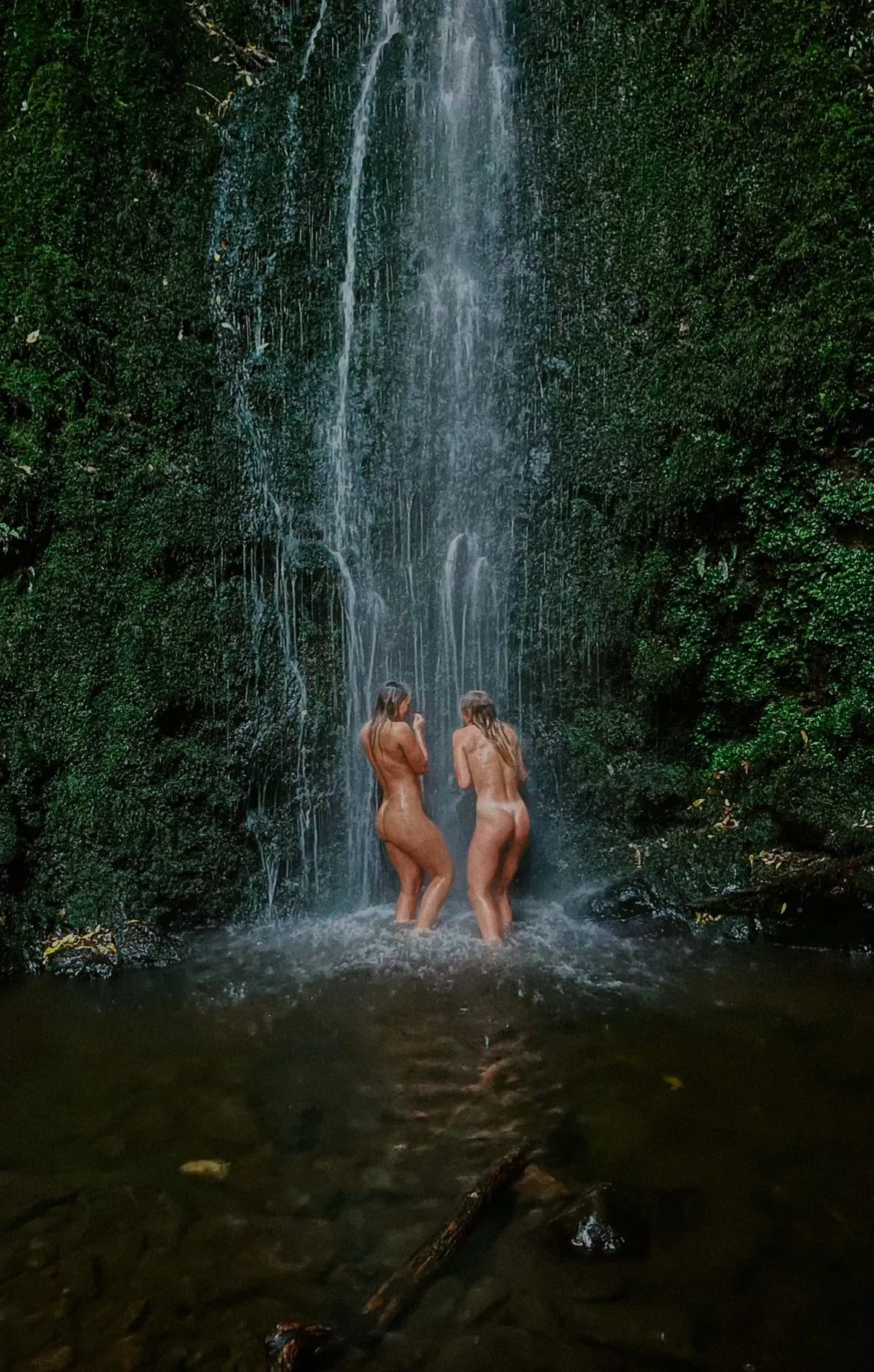 skinny dipping under a waterfall