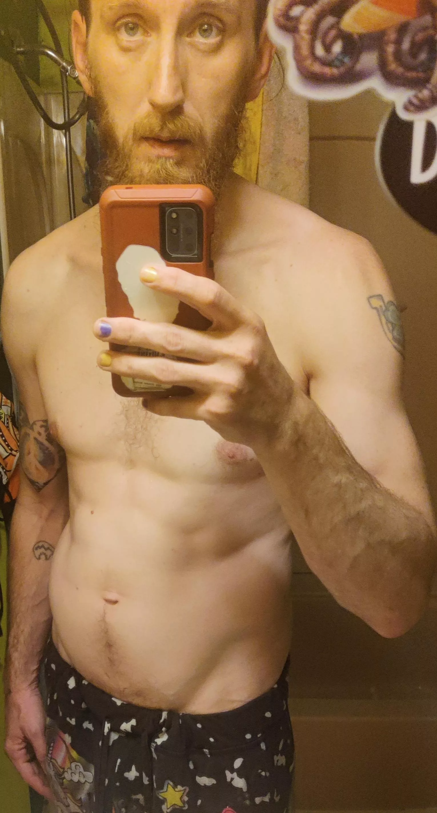 Beard, tattoos, pajamas 