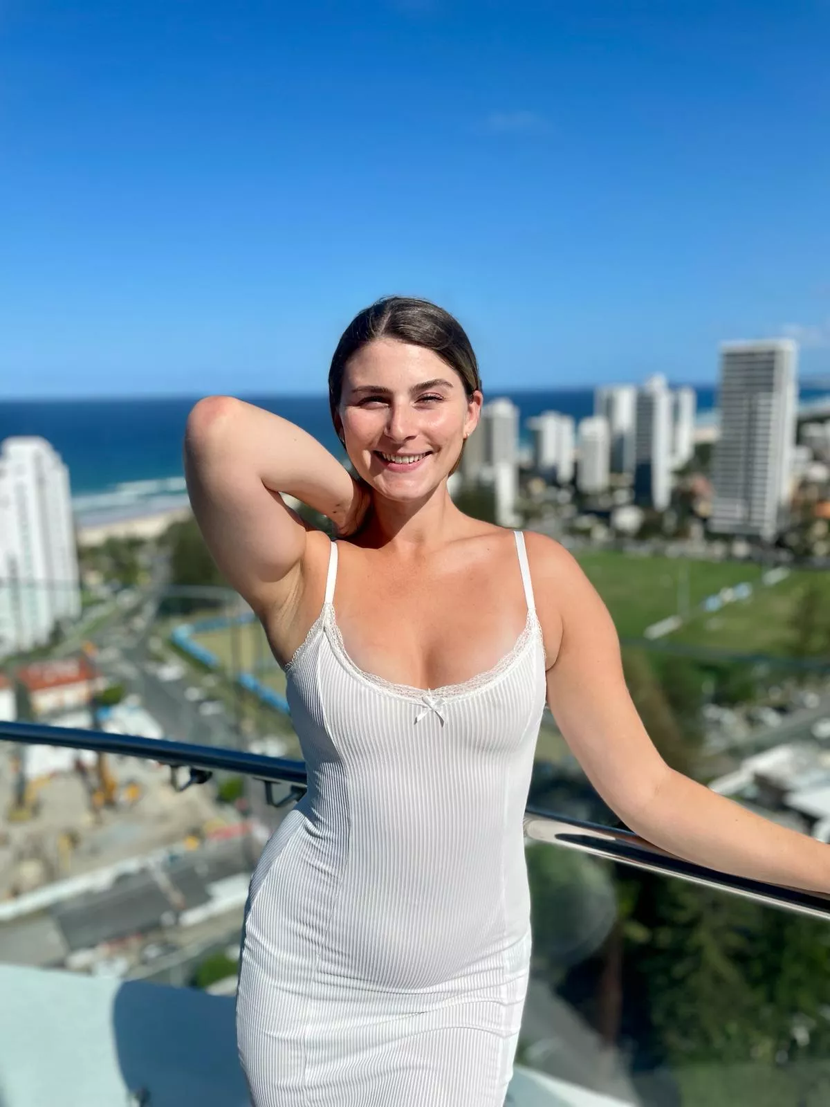 I love my curves in this cute white dress