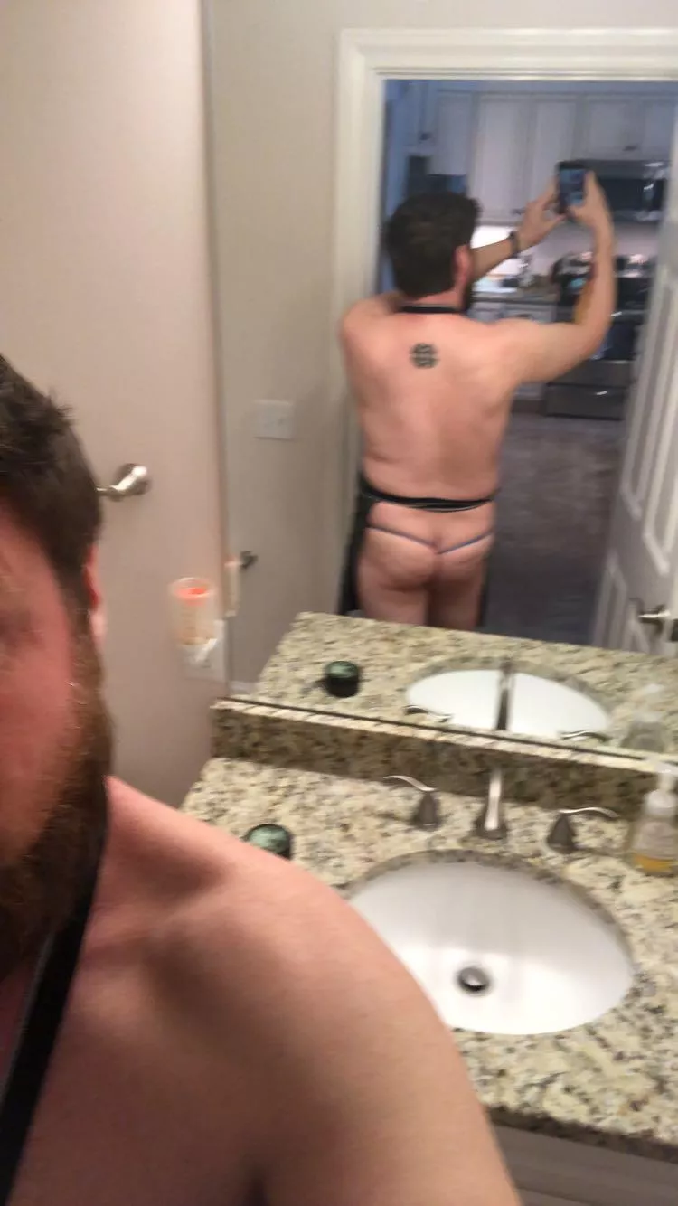 Leaning into the man thong 