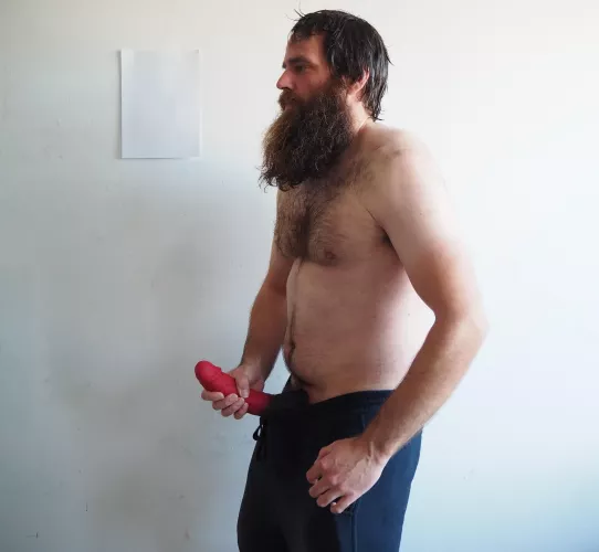 Me, barechest and with a large red dildo
