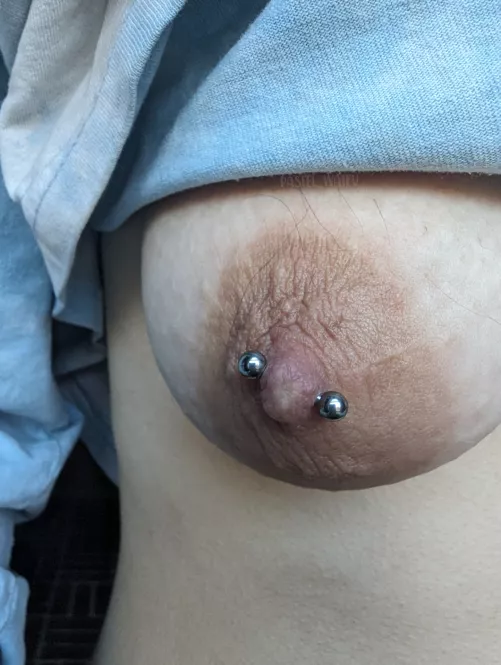 pierced nipple and some hair