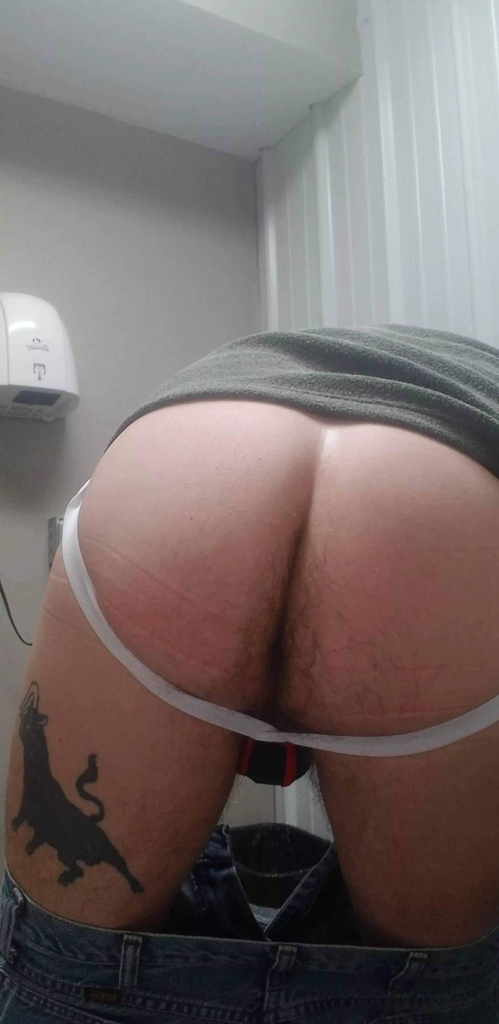Strapped butt at work