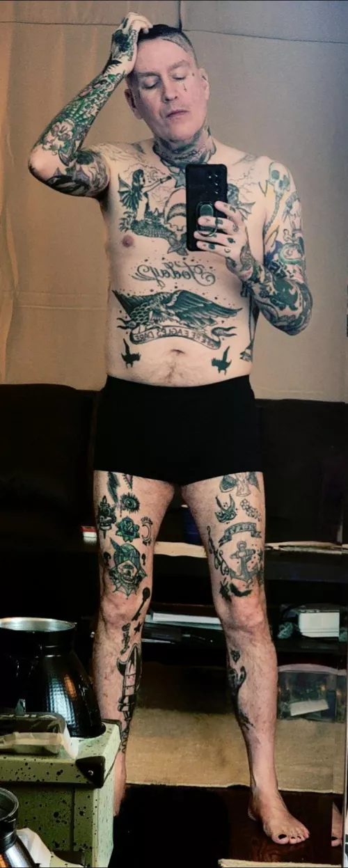 In my studio, preparing for a photoshoot. Who wants to give me head while I get ready?