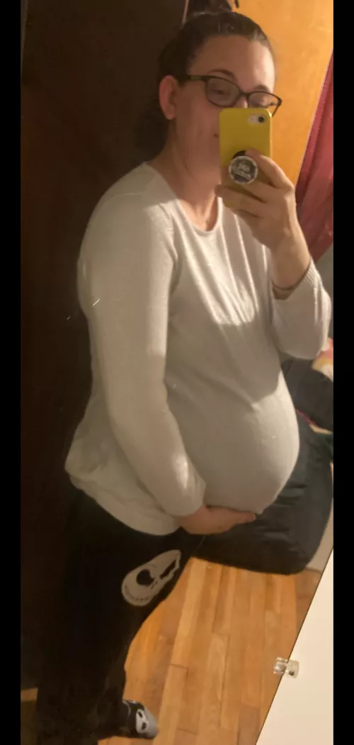 I'm standing behind you waiting to buy groceries. Do you stare, or offer to hold it for me?