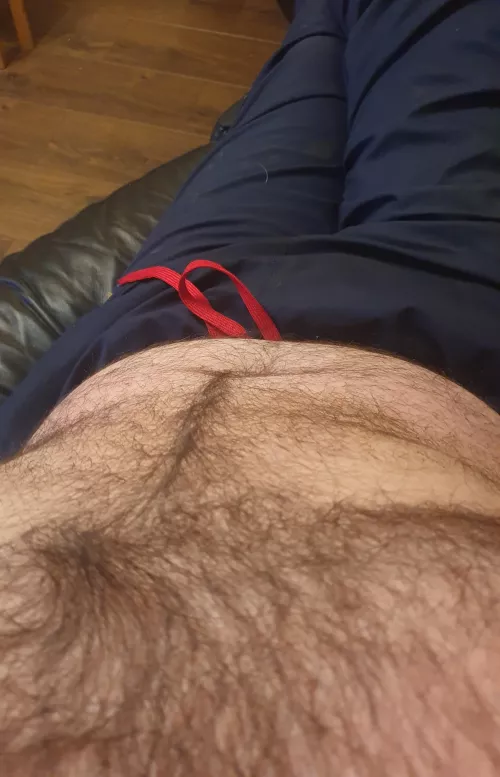 Sofa...cider ...and a hairy chest?