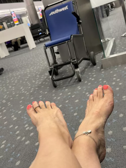 Waiting for my plane, please rub my feet