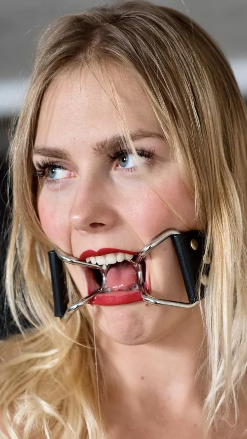 Eagerly awaiting something else stuffed in her mouth. 