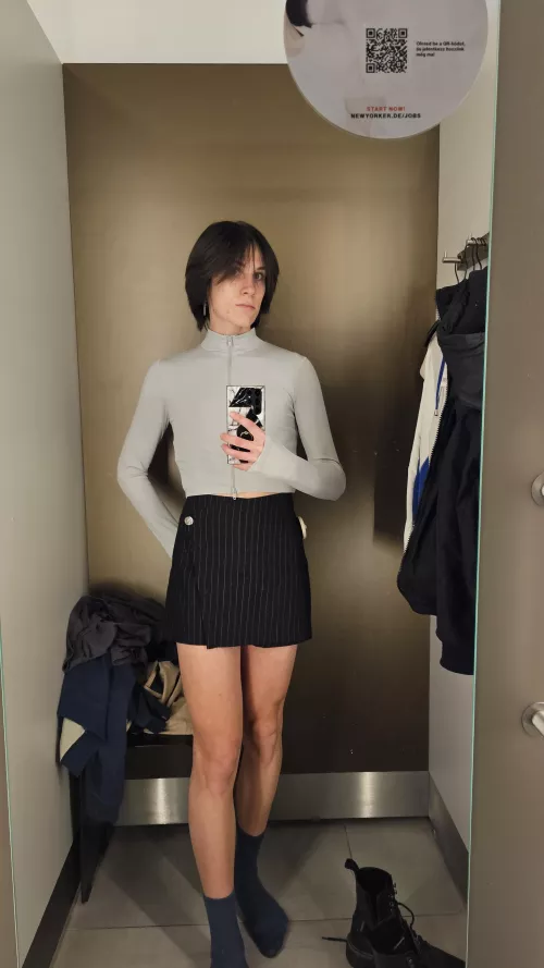 Just a boy trying on a skirt