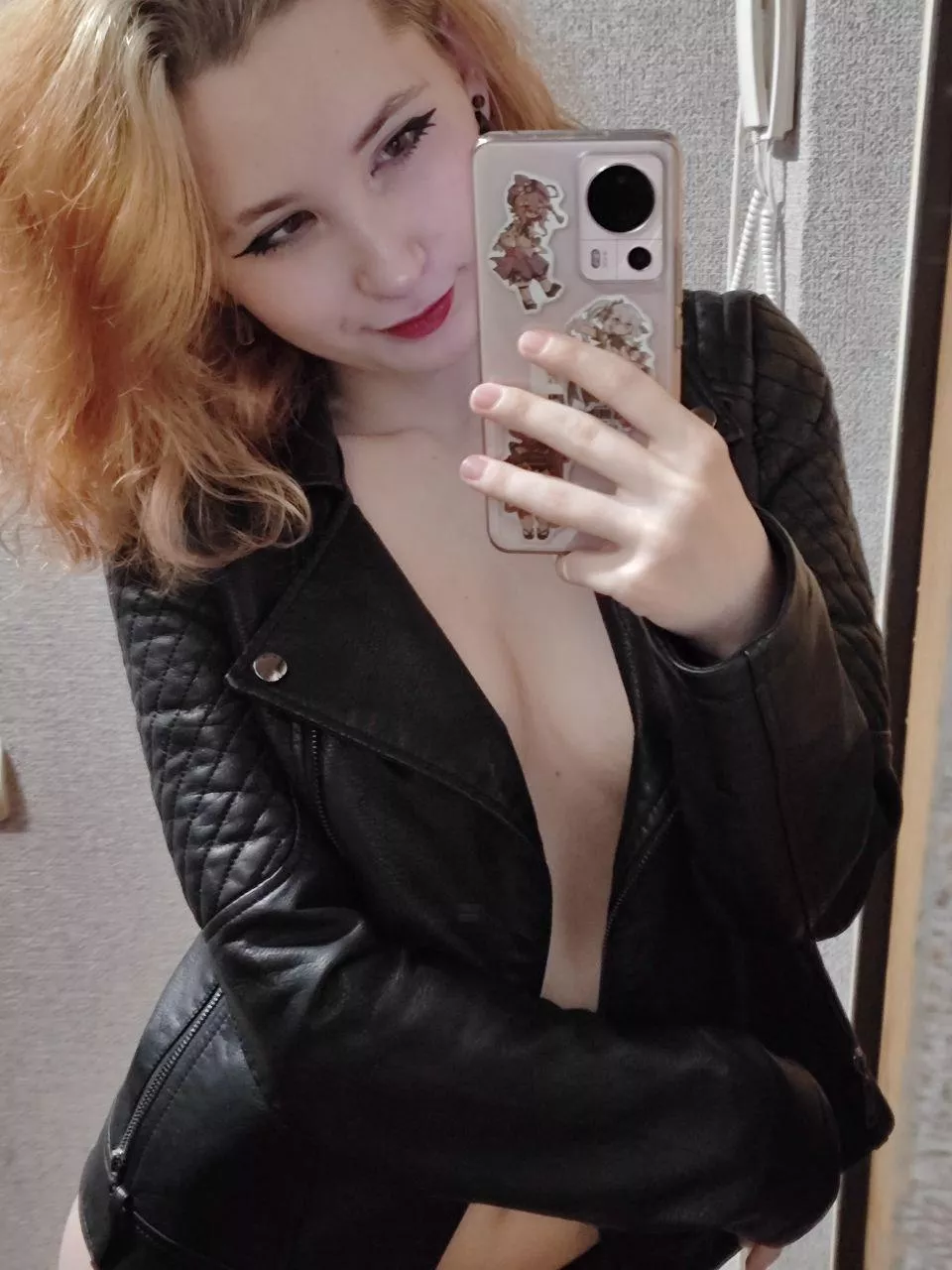 Miniaturized body even sexier in a leather jacket