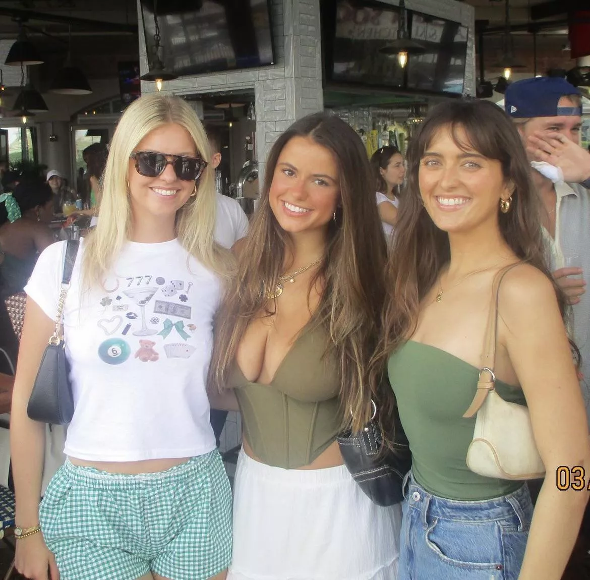 Which girl looks better in green? [3]