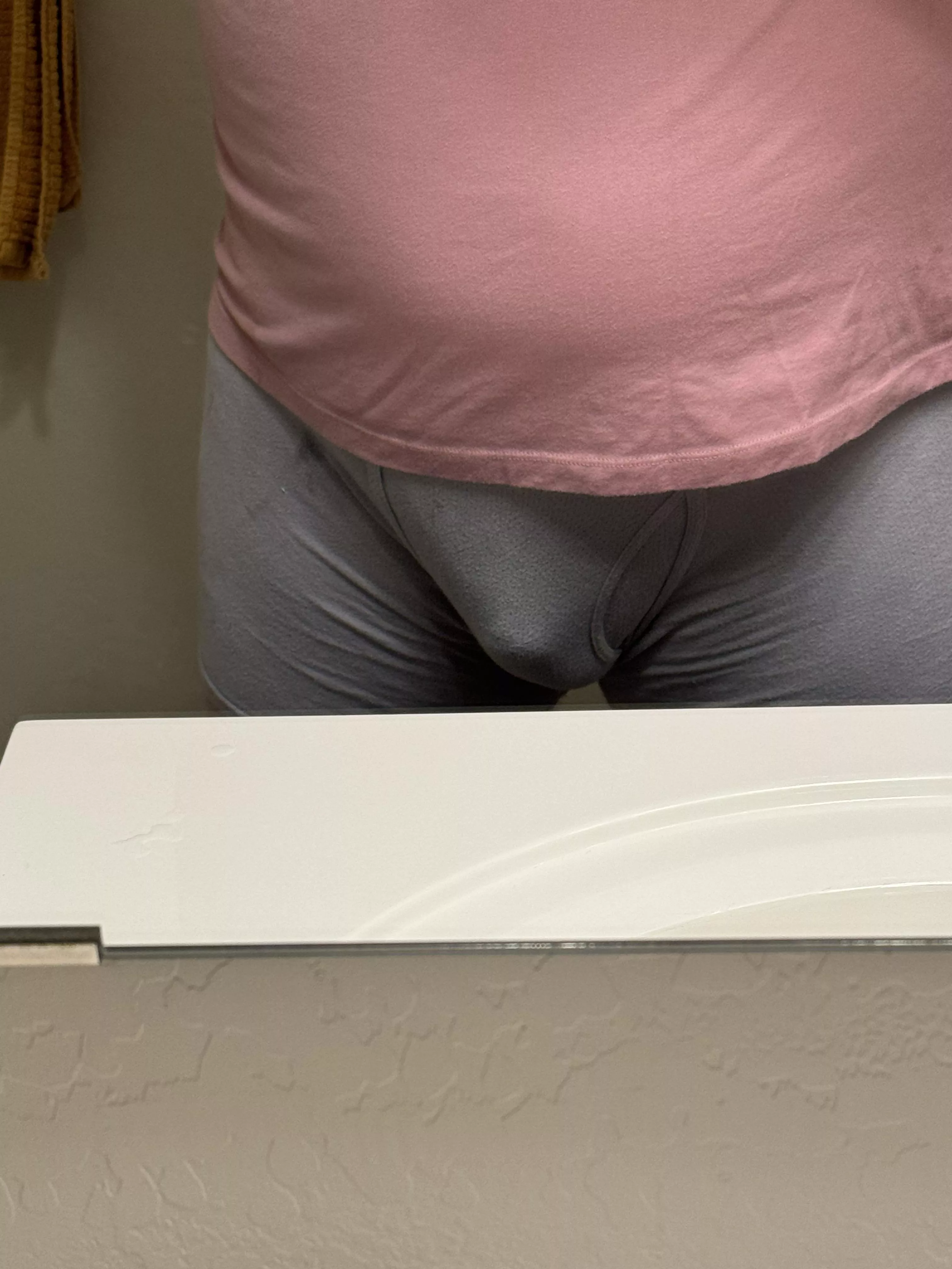 I was changing at a buddy’s house and liked how my bulge looked in the mirror 