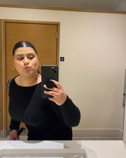 Leaning in for a tight kiss