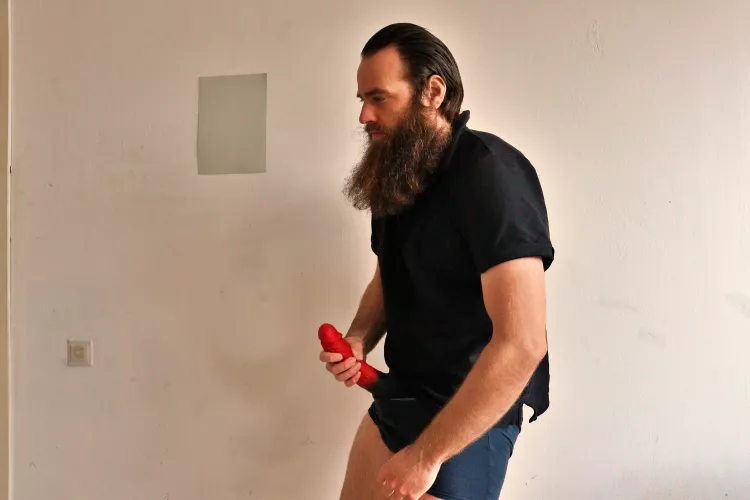 Me, while a 10,5 inch red dildo sticks out of my underwear