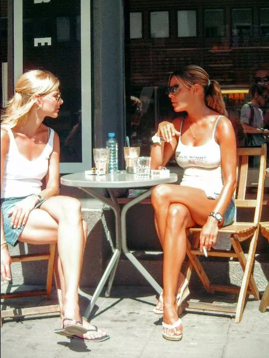 Tanned legs and white cigarettes 