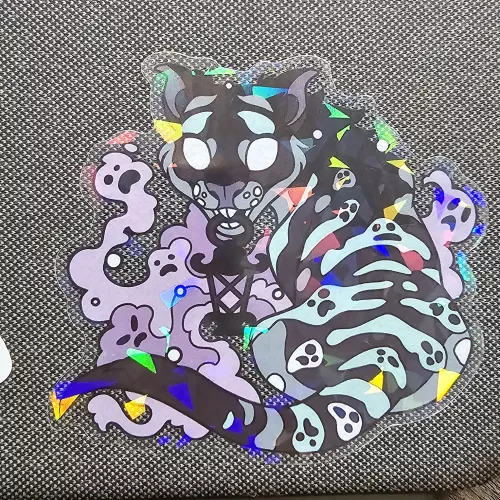 this may be the wrong place for this, but does anyone know the artist of this sticker?