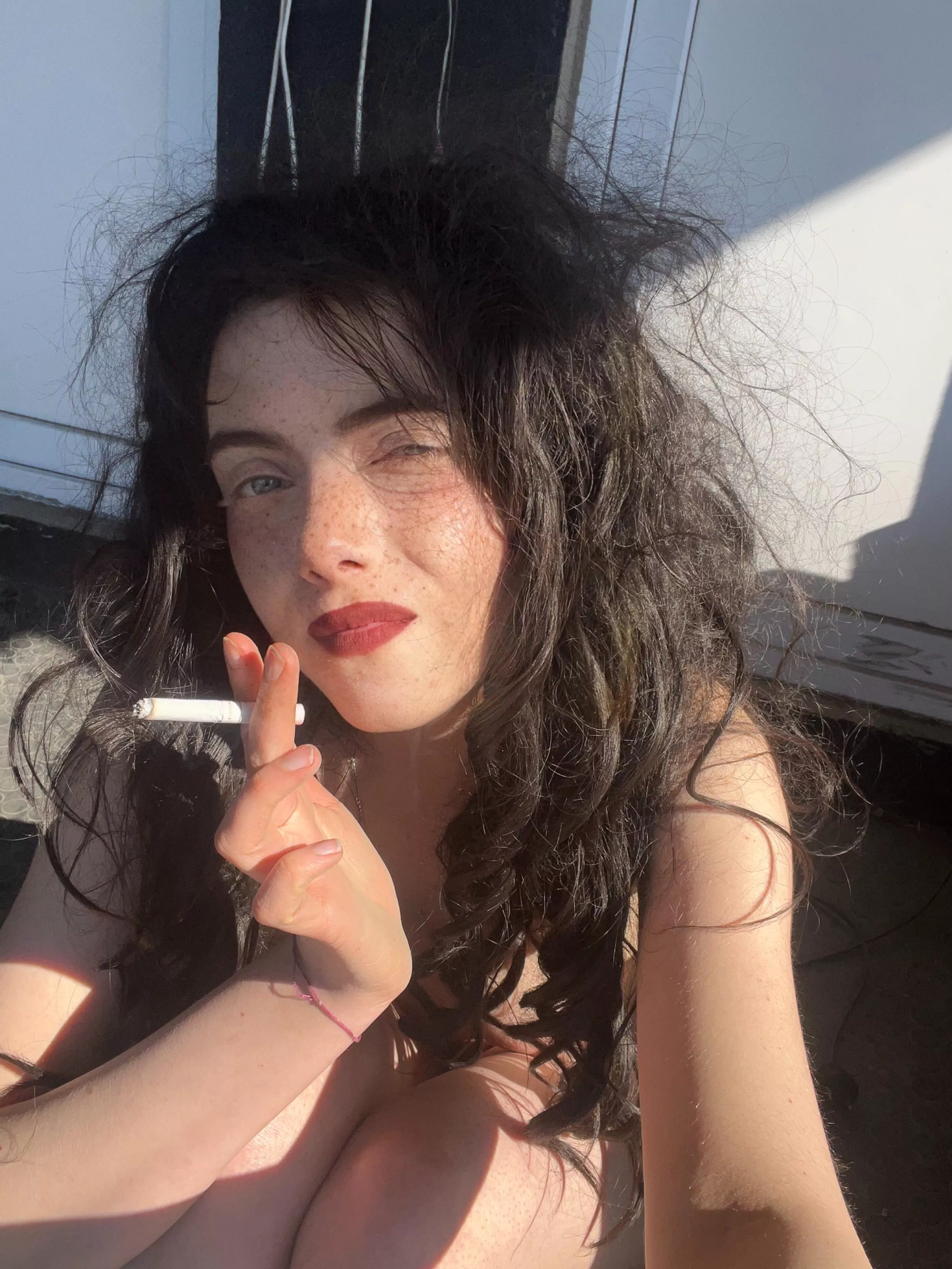 Smoking naked on the balcony is my favorite way to start the day