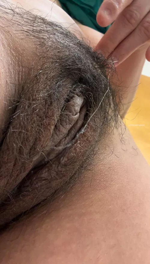 Delicately resting on a soft bed of hair