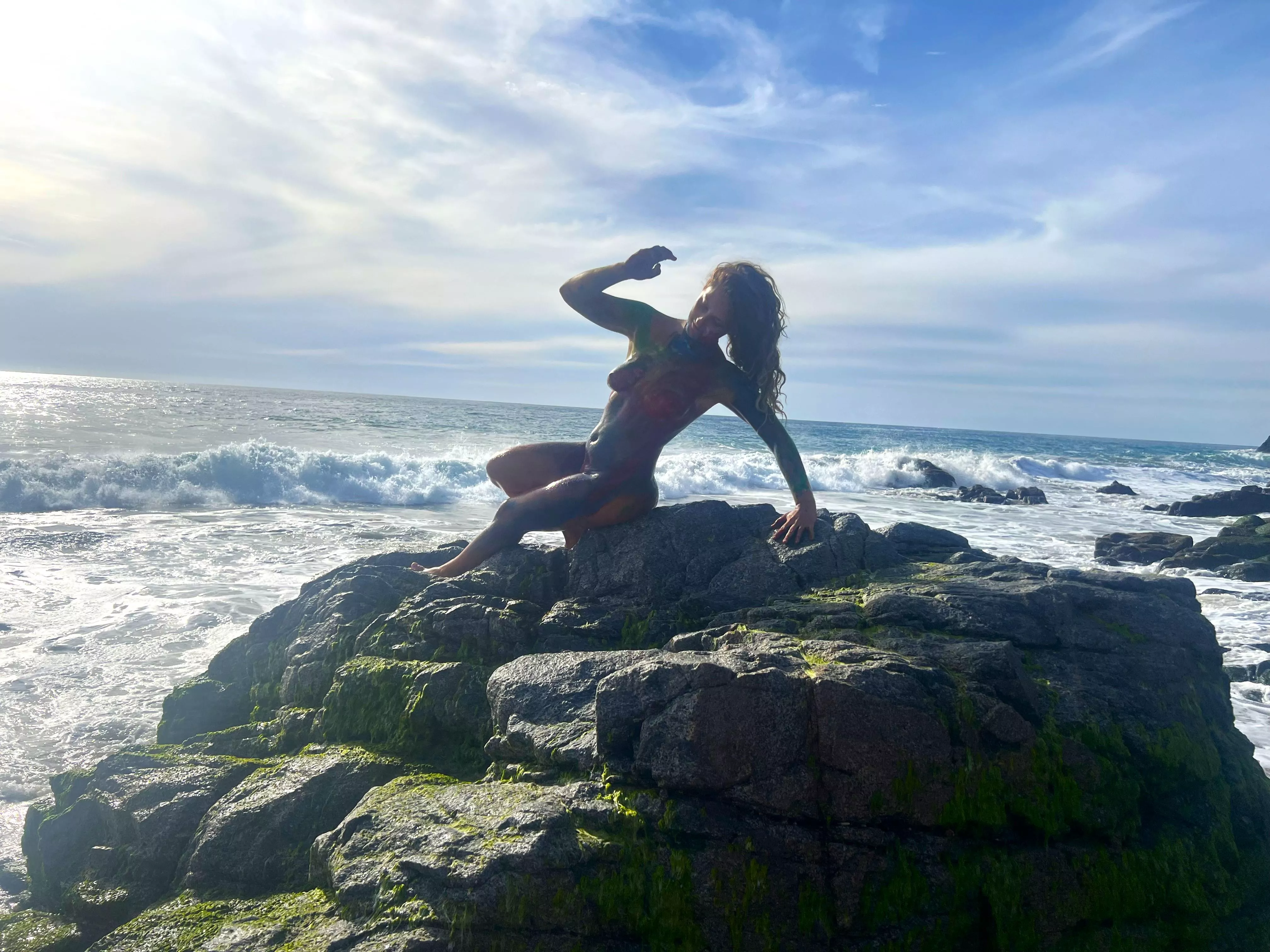 Don't try this at home! Nude rock scrambling on slippery moss