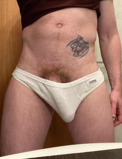 Tattoos with cock trapped underneath