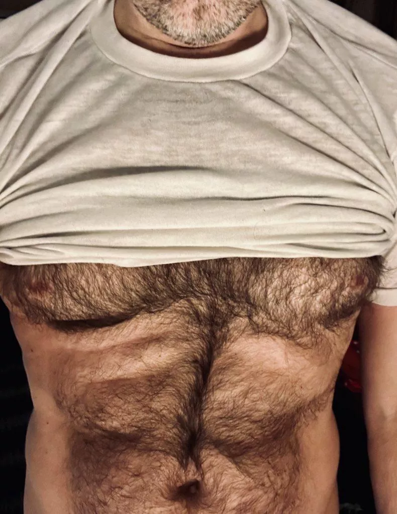 You never know what a bloke's hiding under his shirt...