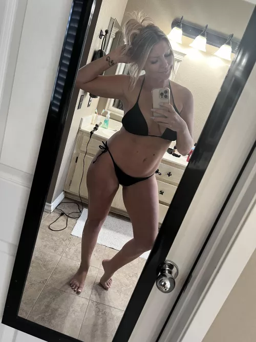 Blonde in a black bikini 