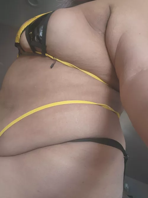 Cute yellow bikini and a chubby body