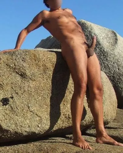 Full naked with a big erection on the rocks!!!