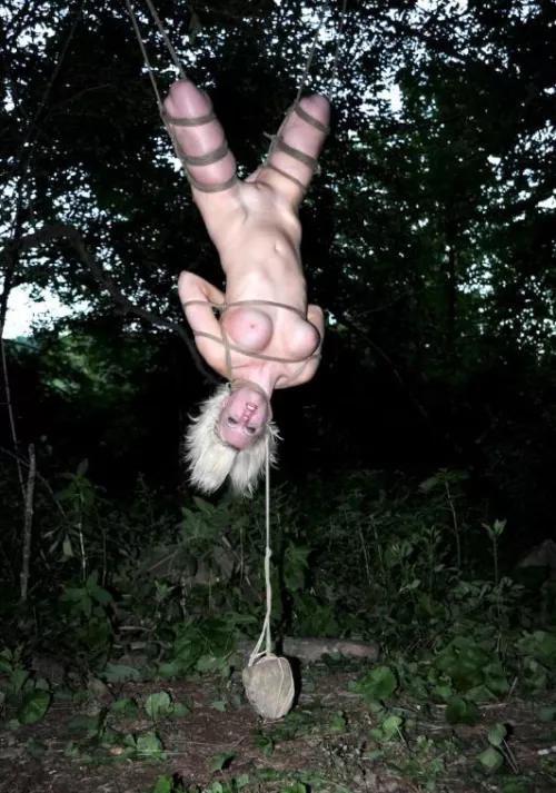 She is rocking the suspension bondage