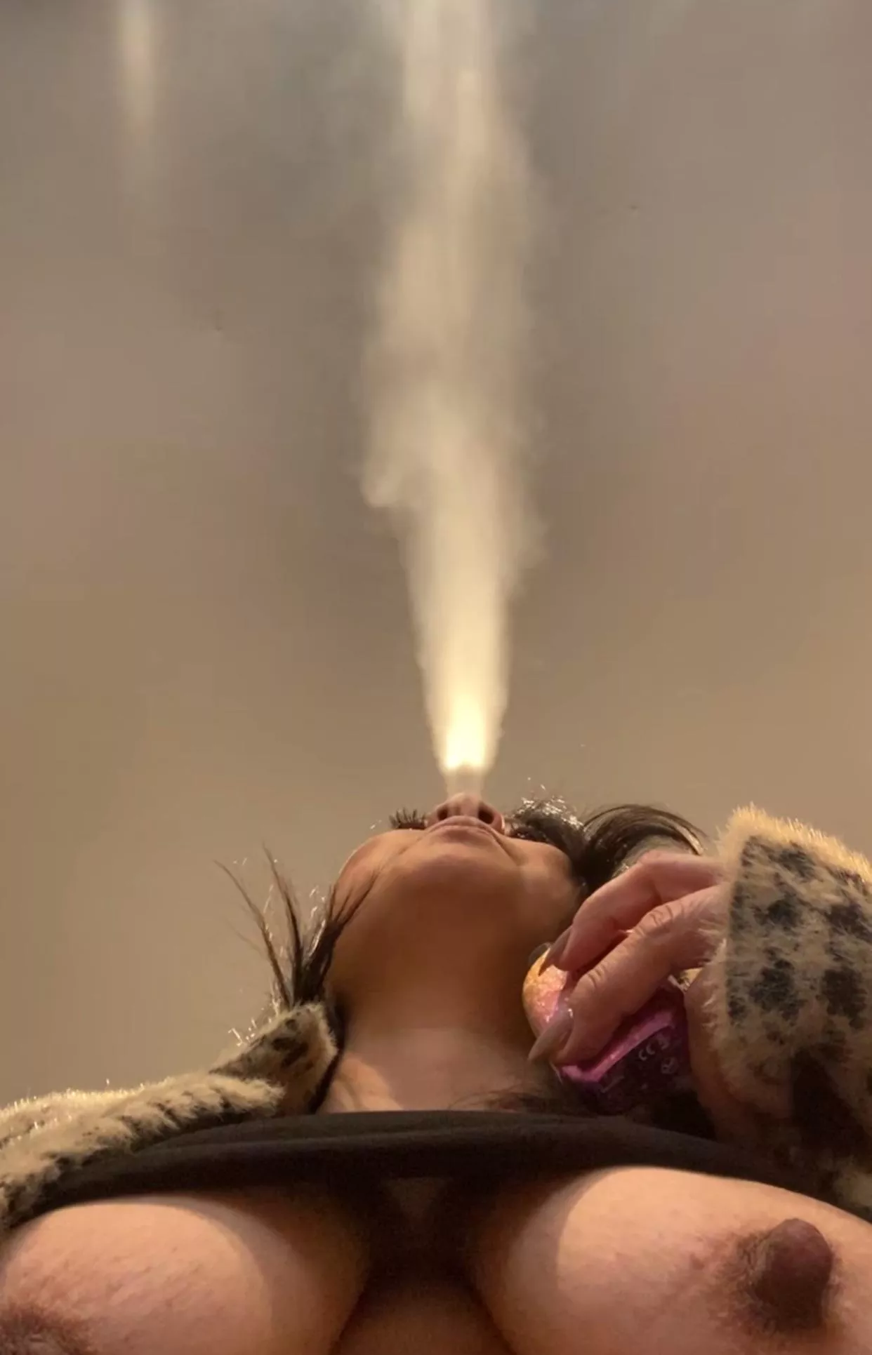 Smoke break with the breast view in the house