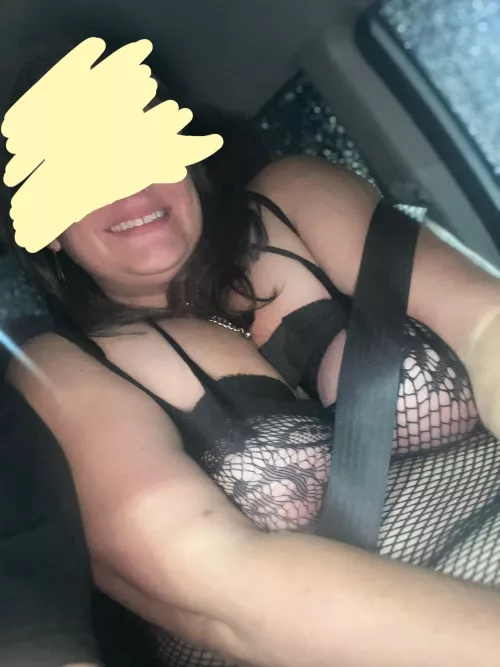 Breast cuffs and a fishnet dress on date night- this is in the drive thru at McDonald’s so we could get home sooner
