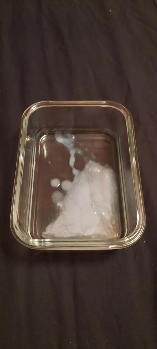 Biggest load I have measured was about 10ml (poured into measuring cup from this tray)