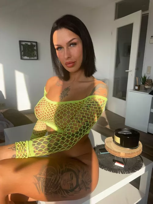 i like the way my tits pushes through the fishnets